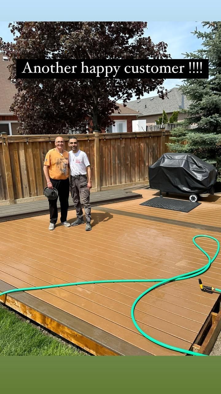 Another happy customer — new backyard deck built with pressure-treated lumber.